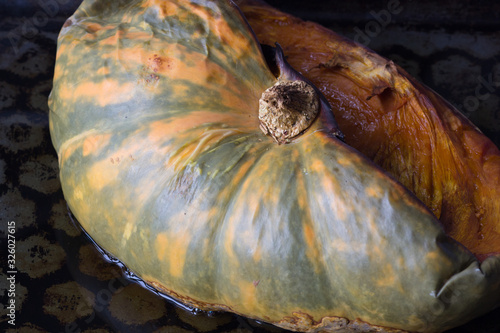 Baked half pumpkin on the baking tra photo