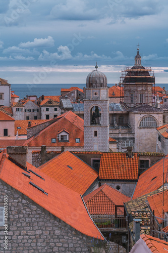 View of Dubrovnik old town buildings and red roofs from the city wall