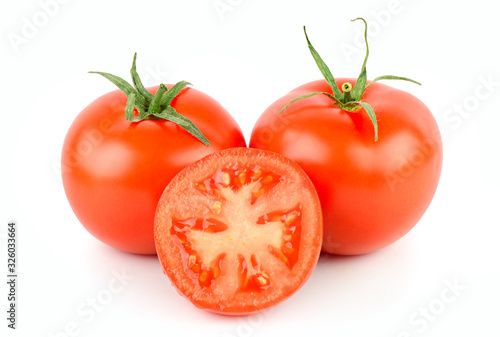 Juicy ripe tomatoes isolated on white