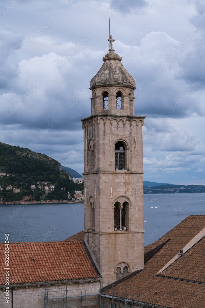 View of Dubrovnik old town buildings and red roofs from the city wall