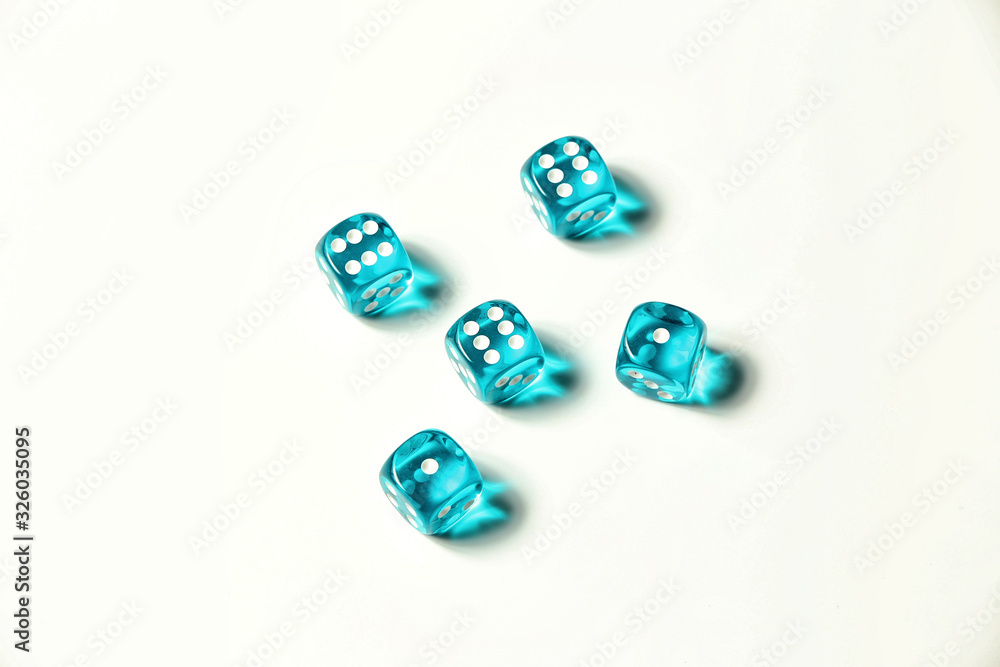 Isolated blue five pieces of transparent dice showing three six and two ones Isolated blue five pieces of transparent dice showing three six and two ones
