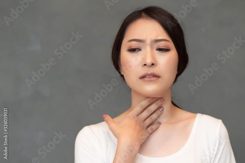 sick woman having sore throat due to virus outbreak  concept of biohazard  biological hazard  preventive health care  disease quarantine  coronavirus outbreak control  COVID-19 sickness
