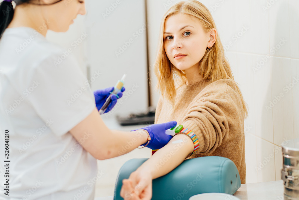 Fototapeta premium man in laboratory in during blood research