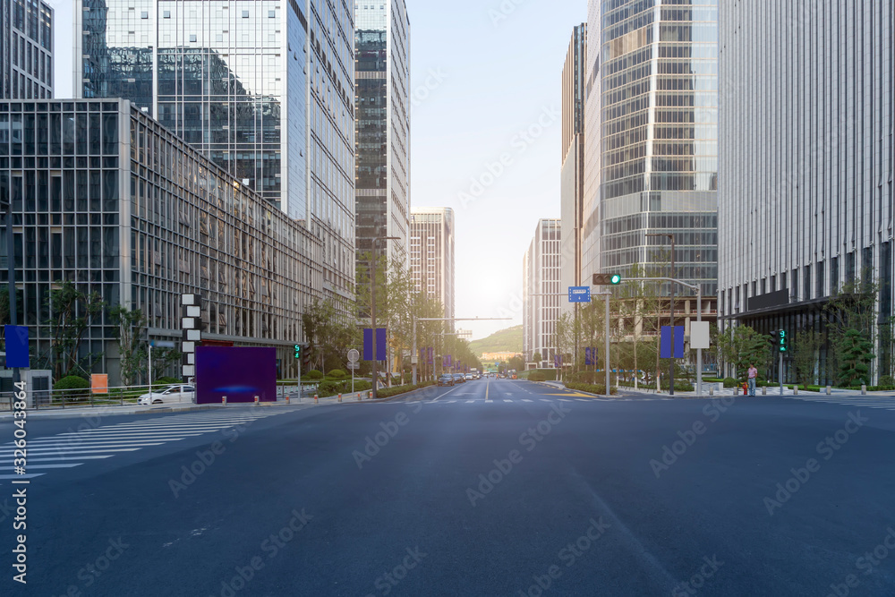Fototapeta premium Urban road and modern office building of Ningbo business district