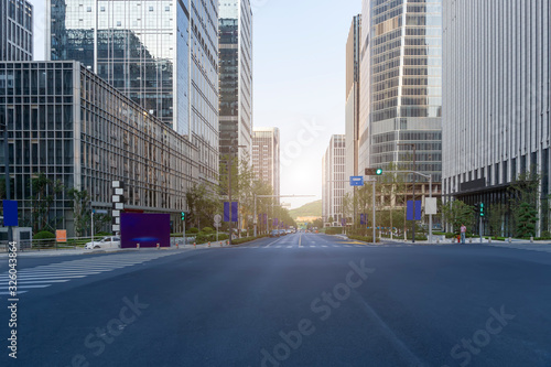 Urban road and modern office building of Ningbo business district © 昊 周