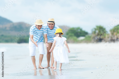 Happy family summer sea beach vacation. Asia young people lifestyle travel enjoy fun and relax in holiday. Travel and Family Concept