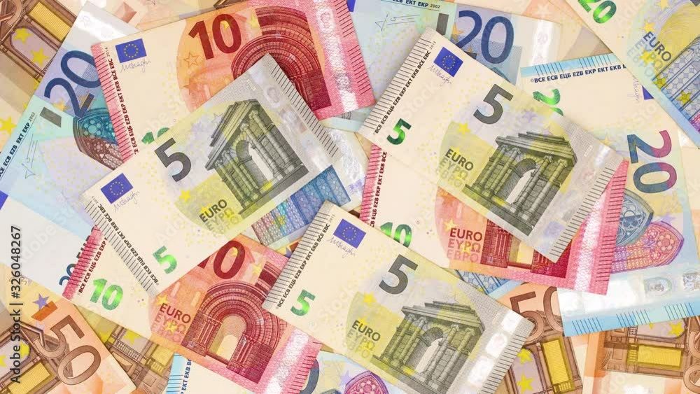Banknotes of fifty, twenty, ten and five euros fill the blue background - Stop motion Banknotes of fifty, twenty, ten and five euros fill the blue background - Stop motion