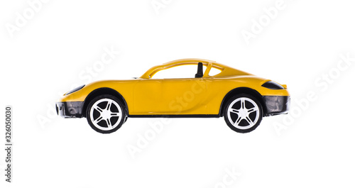 Fototapeta Naklejka Na Ścianę i Meble -  toy yellow sports car isolated on white background