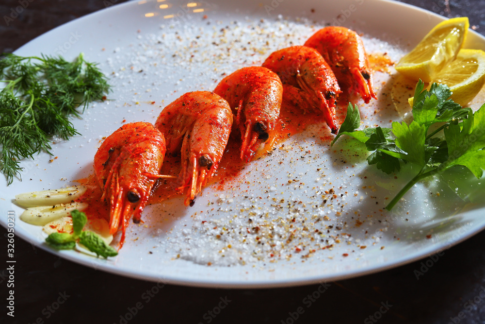 fried shrimp with various spices, lemon and sauce fried shrimp with various spices, lemon and sauce