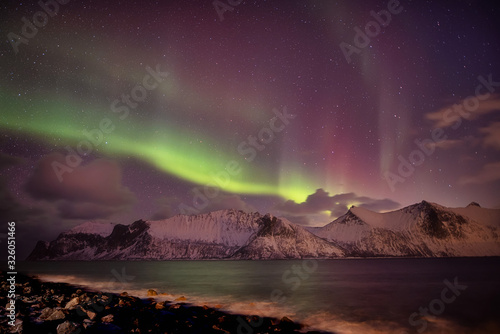 Northern lights aurora a wonderful game of colorful lights during the night © Jaro