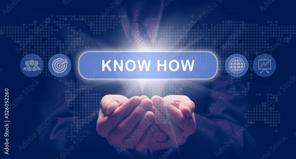 Businessmans cupped hands holding an Know How business concept on a computerised display.
