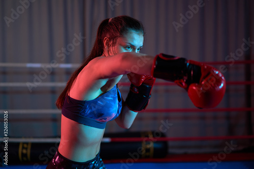 Female kickboxer training