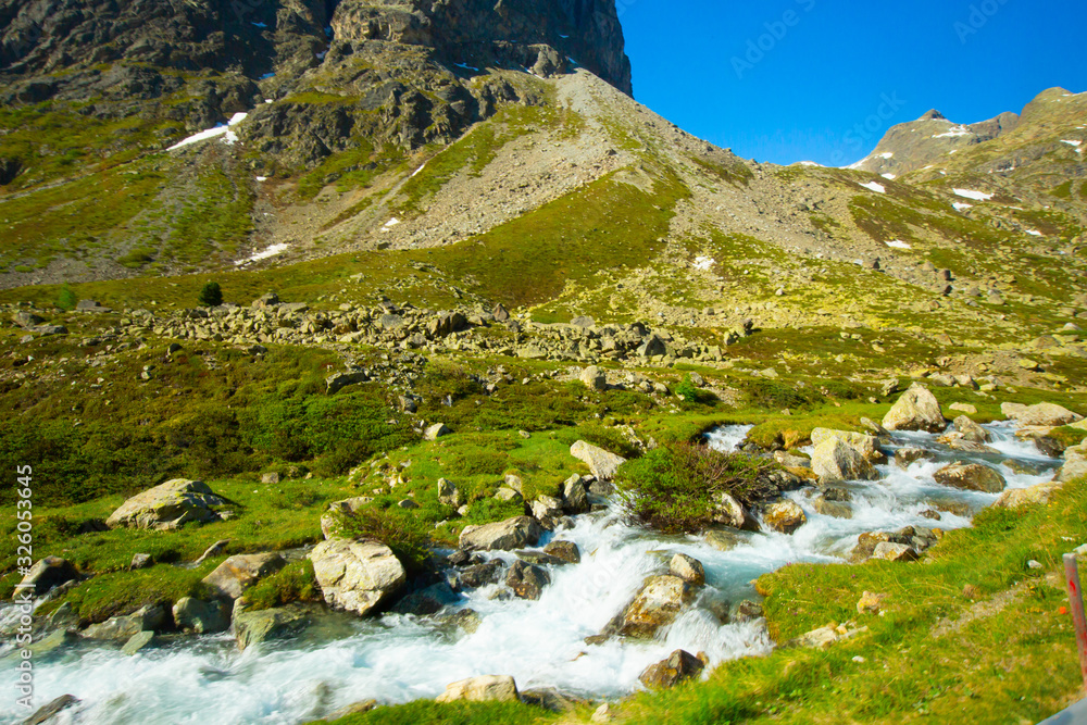 Alps, Switzerland in spring with bright blue skies and beautiful clouds