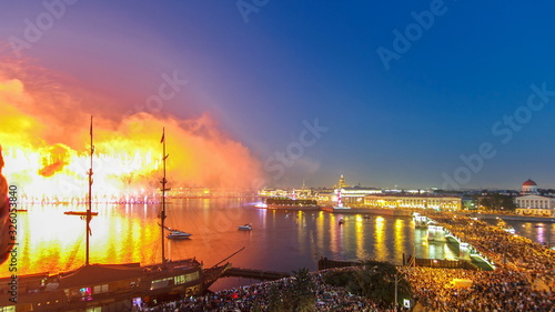 Fireworks timelapse over the city of St. Petersburg Russia on the feast of "Scarlet Sails", view from roof.