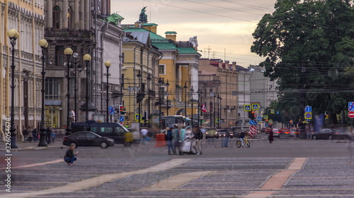Evening in Saint Petersburg timelapse. Unknown people walking to the Palace square.