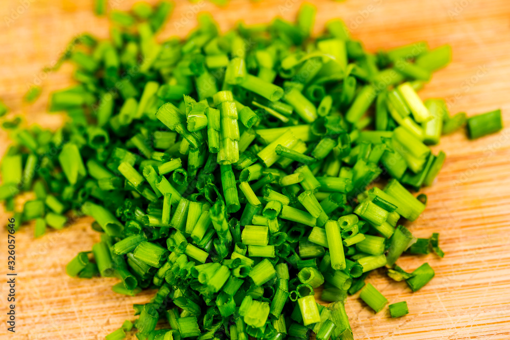 chive, fesh cut leaves in a closeup chive, fesh cut leaves in a closeup