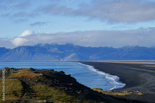 Black beach coast of Iceland famous place to travel