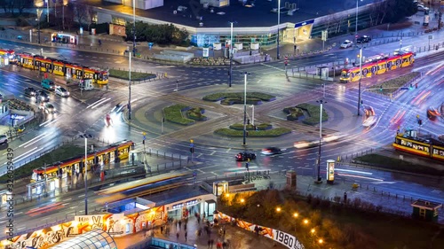 timelapse of aerial view of busy trafic at Dmowski roundabout during dusk, Warsaw, Poland