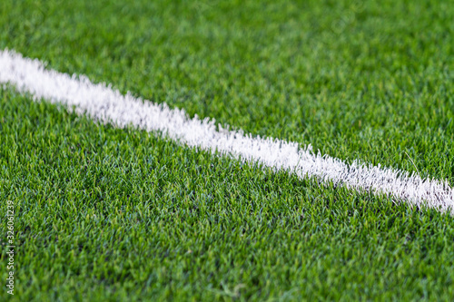 white line on a green soccer field