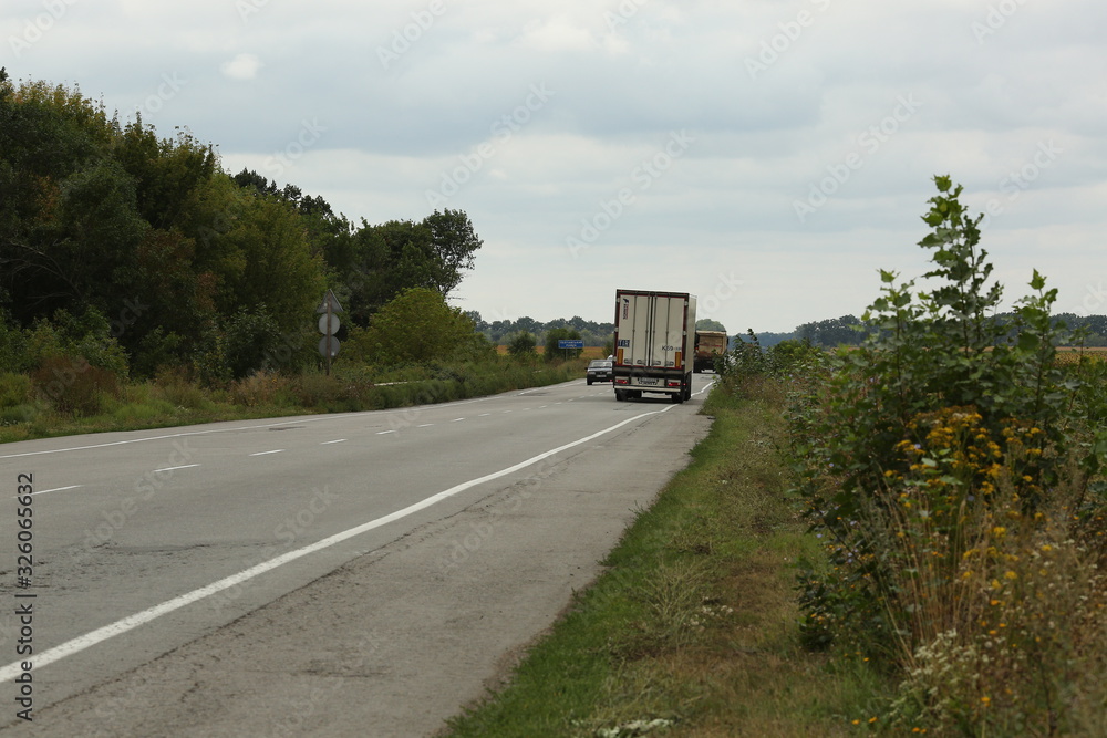  asphalt road, the highway where bulky transport goes outside the city