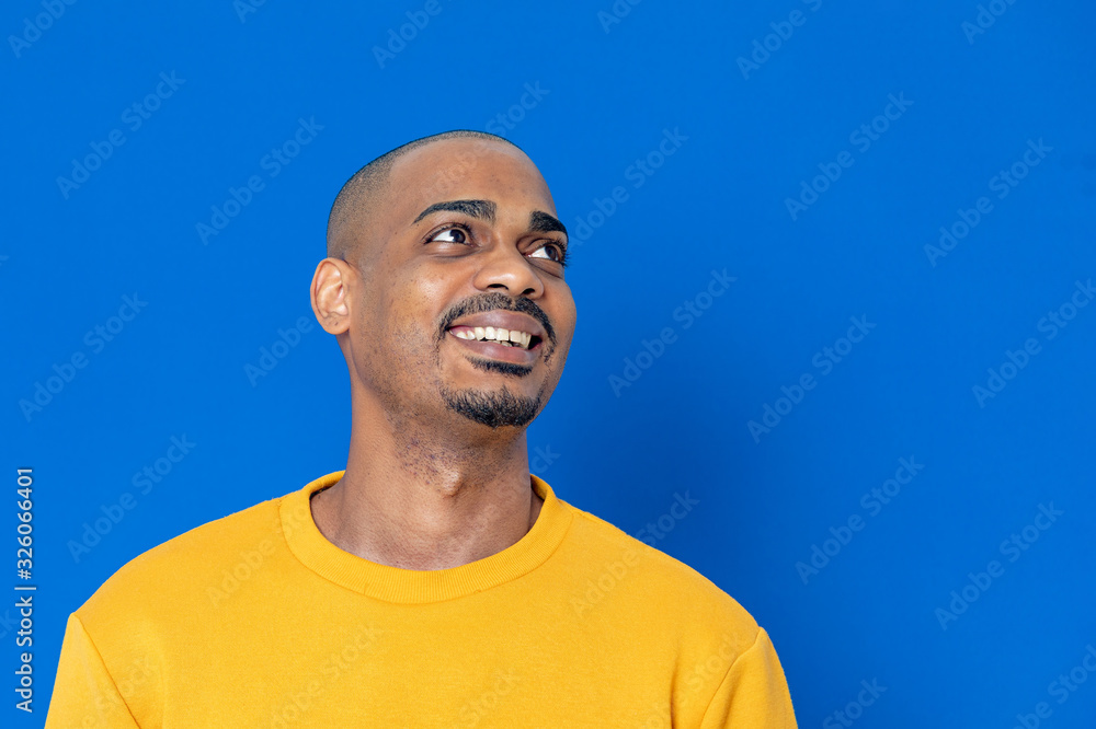 African guy with a yellow jersey African guy with a yellow jersey