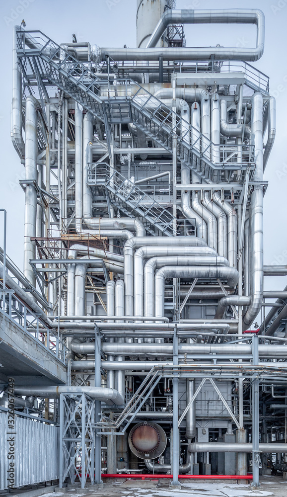 Fototapeta premium oil refining equipment at a large chemical plant, blue tone