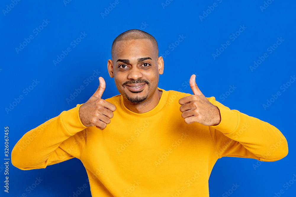 Fototapeta premium African guy with a yellow jersey