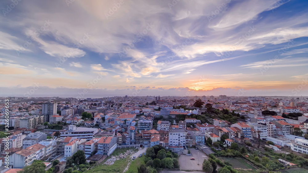 Rooftops of Porto's old town on a warm spring day timelapse sunset, Porto, Portugal