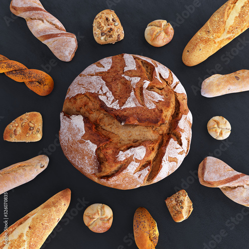 Different types of bread and rolls in the top view. Kitchen or bakery poster design on dark.