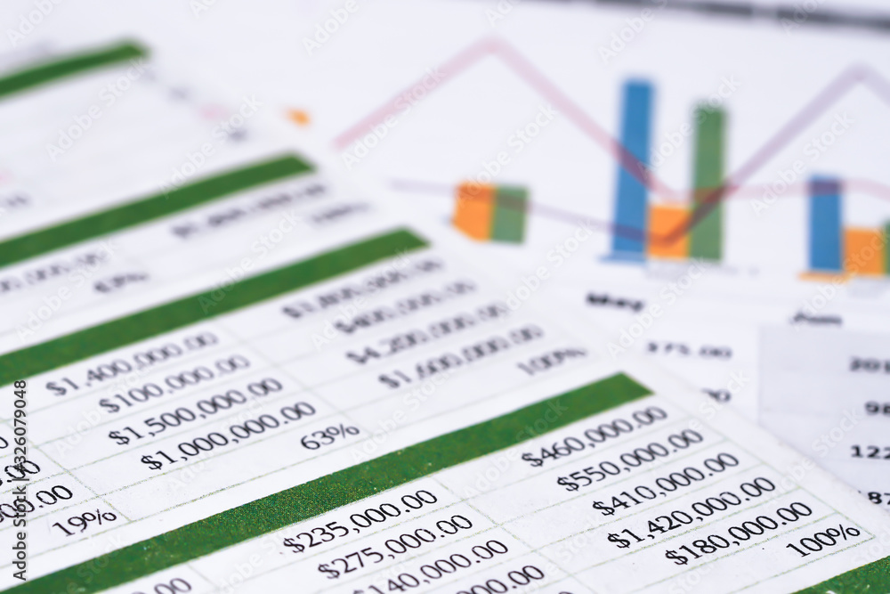 Spreadsheet table paper with graph. Finance development, Banking Account, Statistics Investment Analytic research data economy, trading, Mobile office reporting Business company meeting concept. Spreadsheet table paper with graph. Finance development, Banking Account, Statistics Investment Analytic research data economy, trading, Mobile office reporting Business company meeting concept.