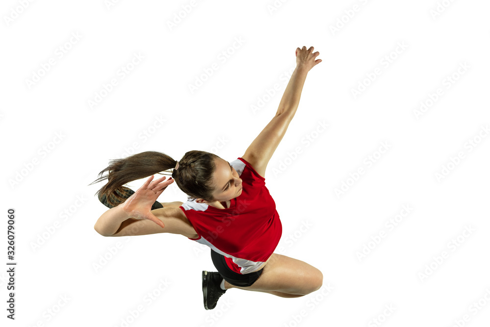 In jump and flight. Young female volleyball player isolated on white studio background. Woman in sportswear and sneakers training, playing. Concept of sport, healthy lifestyle, motion and movement. In jump and flight. Young female volleyball player isolated on white studio background. Woman in sportswear and sneakers training, playing. Concept of sport, healthy lifestyle, motion and movement.