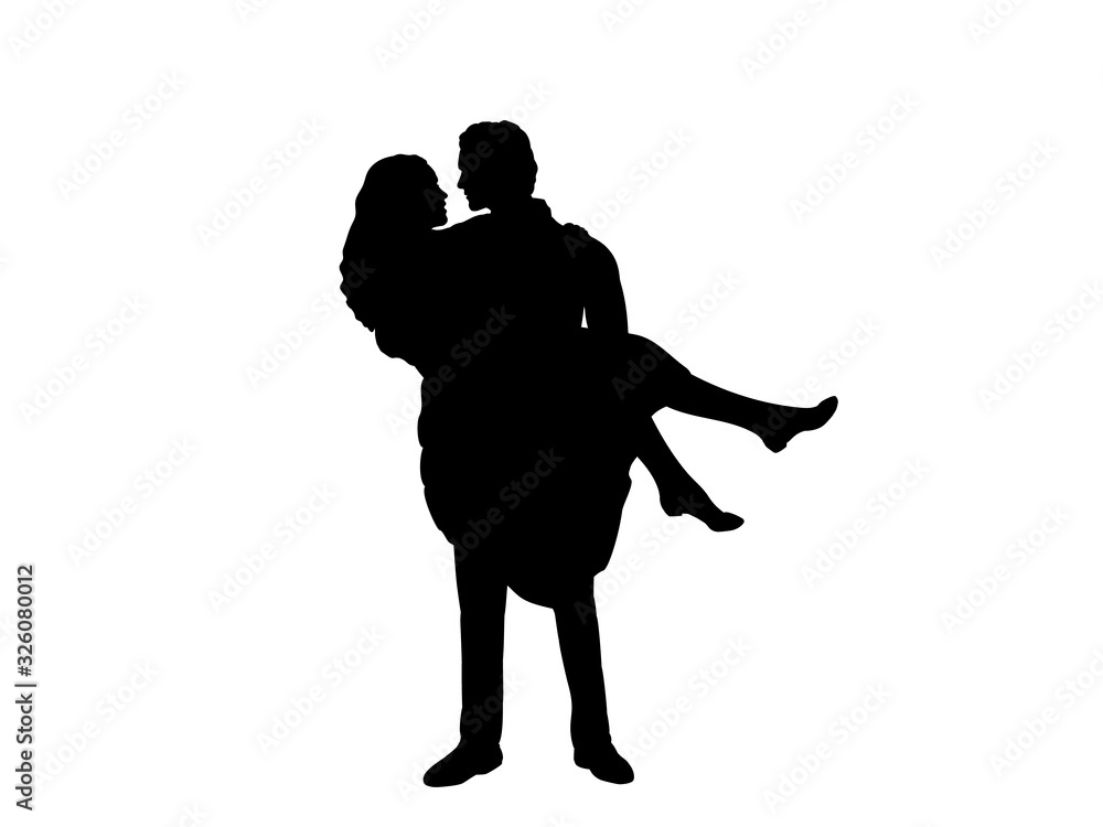 Silhouette of a man holding a woman in her arms looking at each other