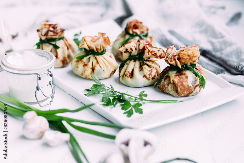 Pancakes with mushroom filling with sour cream Pancakes with mushroom filling with sour cream