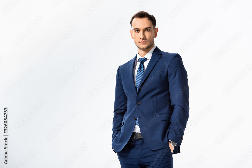 successful young businessman in blue suit looking away isolated on white successful young businessman in blue suit looking away isolated on white