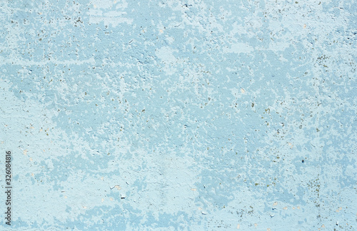 Aged textured concrete wall background painted with light blue color for your design, closeup, copy space