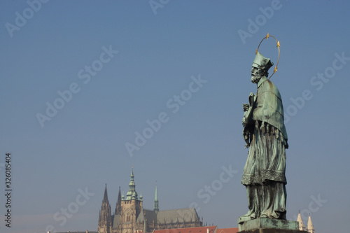 Prague (Czech Republic). Sculpture of San Juan Nepomuceno or Juan de Nepomuk on the Charles bridge in the city of Prague photo