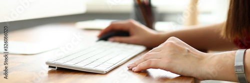 Wallpaper Mural Hands of woman working on computer with mouse in office Torontodigital.ca