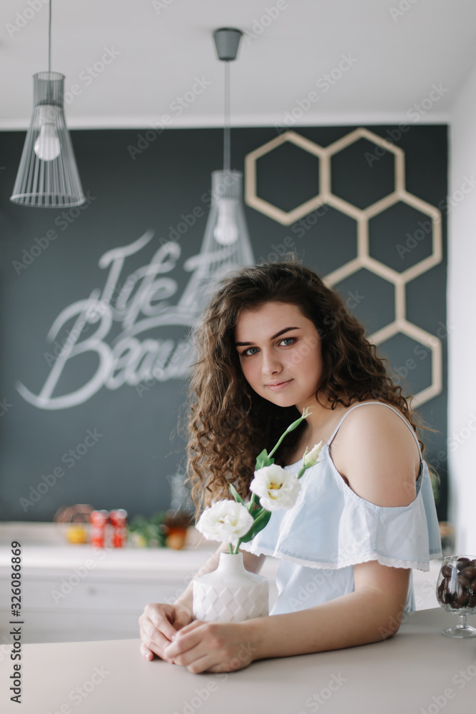 Obraz premium Portrait of a beautiful girl. Romantic shot. Young pretty happy woman in a dress. Fashion style photo of a smiling girl