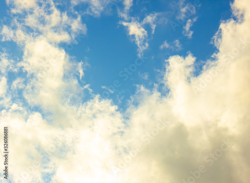 blue sky and white clouds which are like a smoke