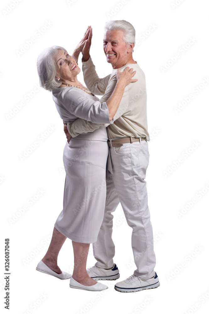 Happy senior couple dancing isolated on white background Happy senior couple dancing isolated on white background
