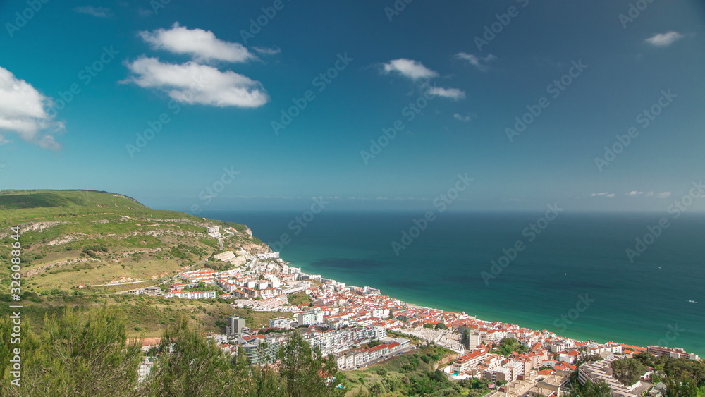 Aerial view on the coastal town of Sesimbra in Portugal timelapse
