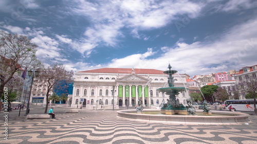 The National Theatre D. Maria. Rossio Square with fountain, Lisbon, Portugal timelapse