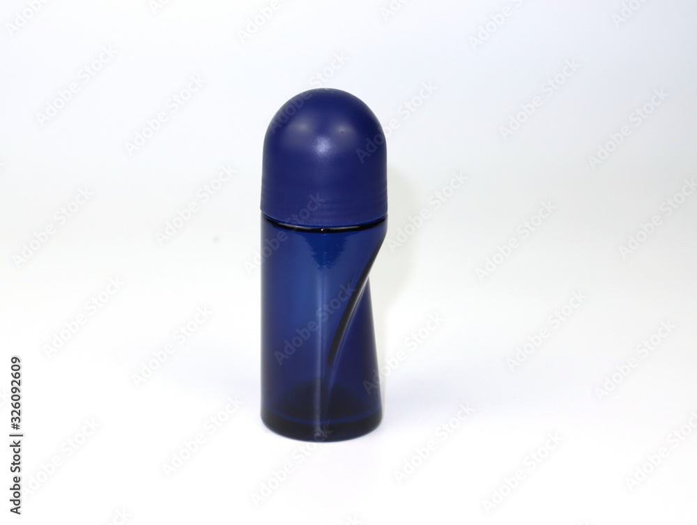 Blue bottle deodorant isolated on white background. Blue bottle deodorant isolated on white background.
