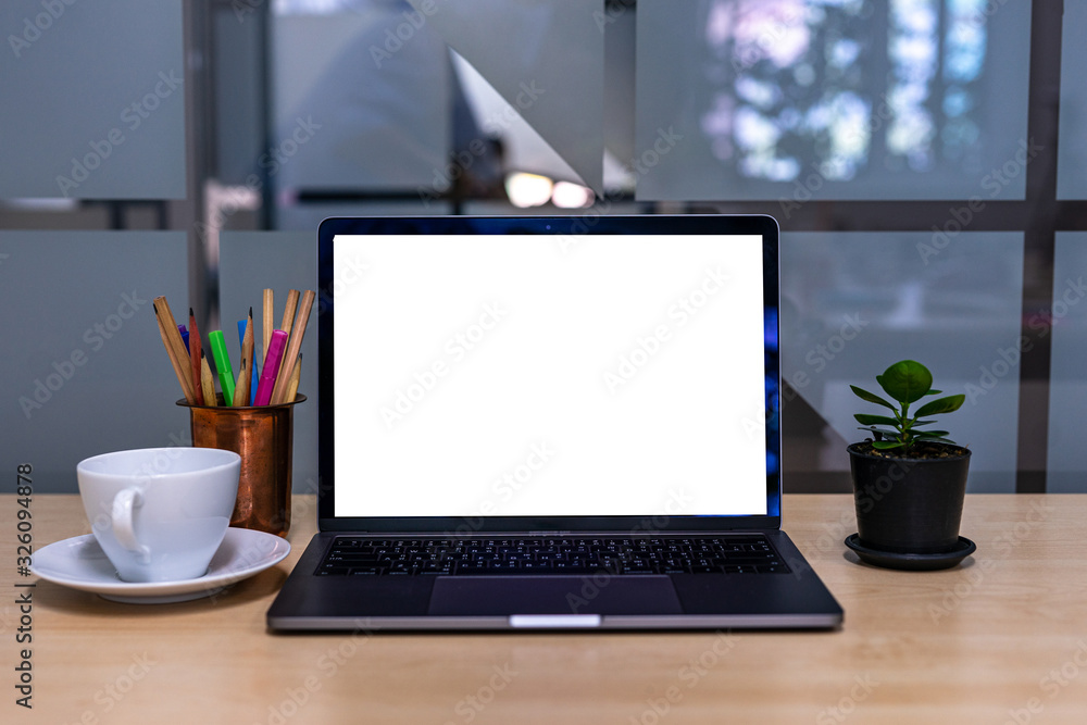 A laptop on the table. A laptop on the table.