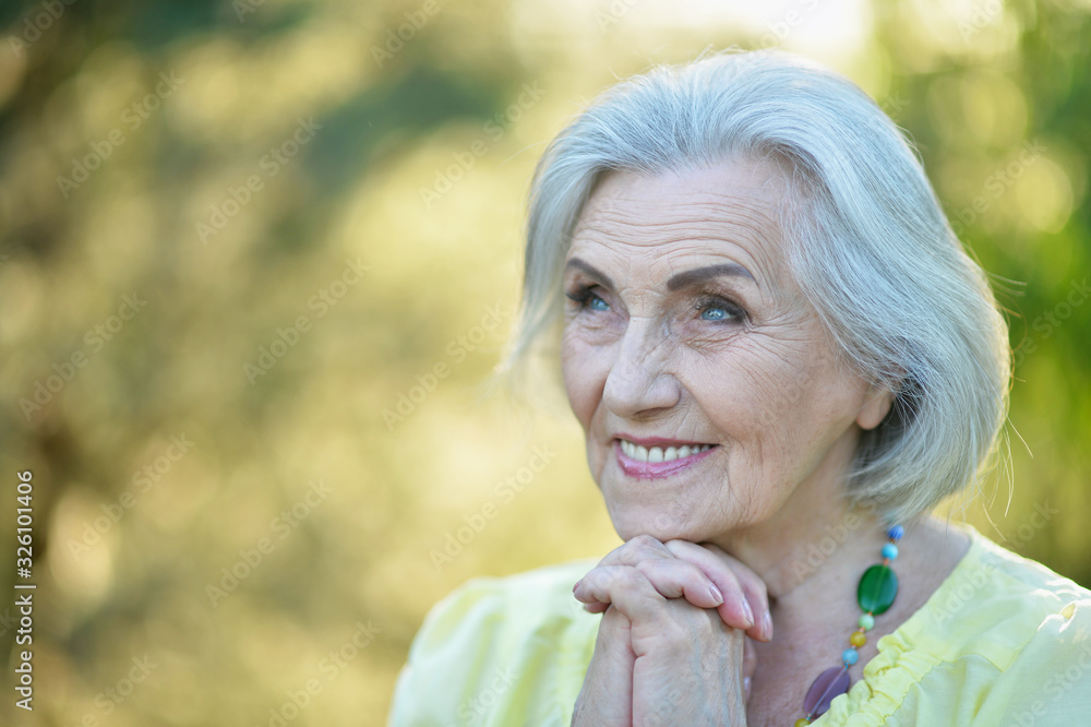 Close up portrait of happy smiling senior beautiful woman Close up portrait of happy smiling senior beautiful woman
