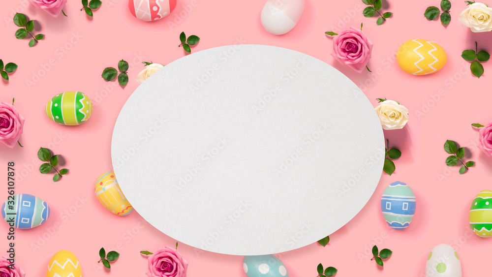 Colorful Easter eggs with round shaped paper overhead view flat lay