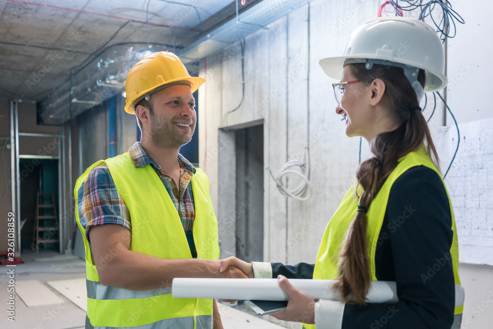 Handshake on the construction site Handshake on the construction site