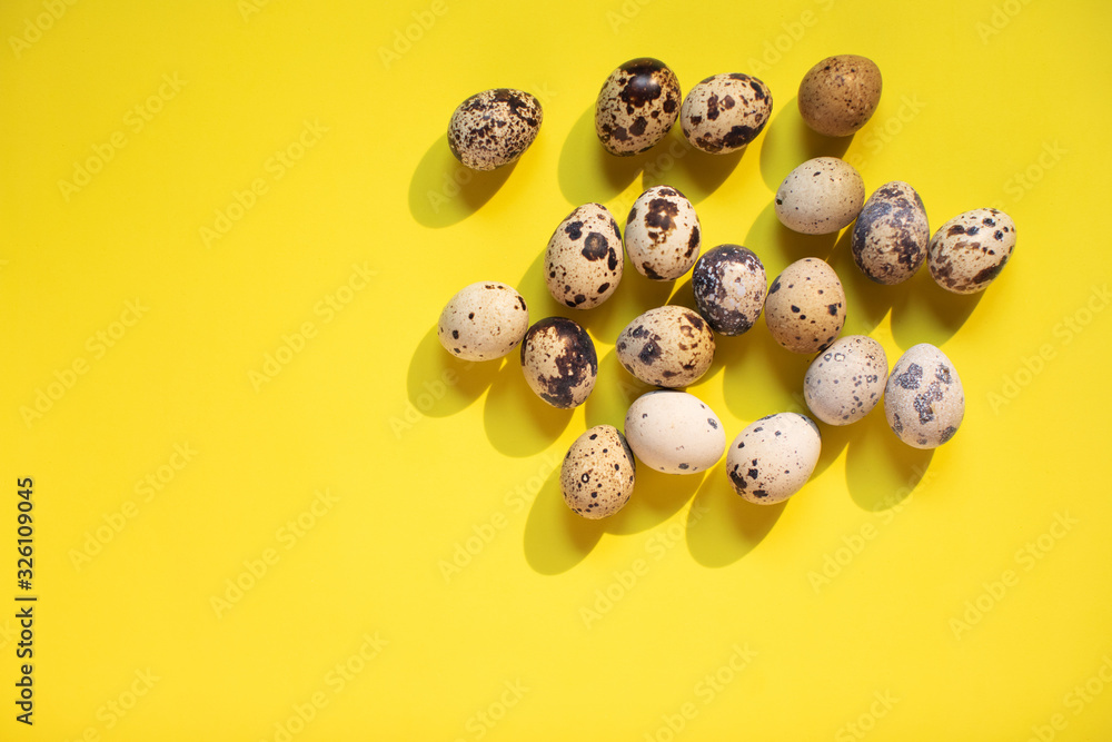 Easter eggs on yellow background. Holiday background