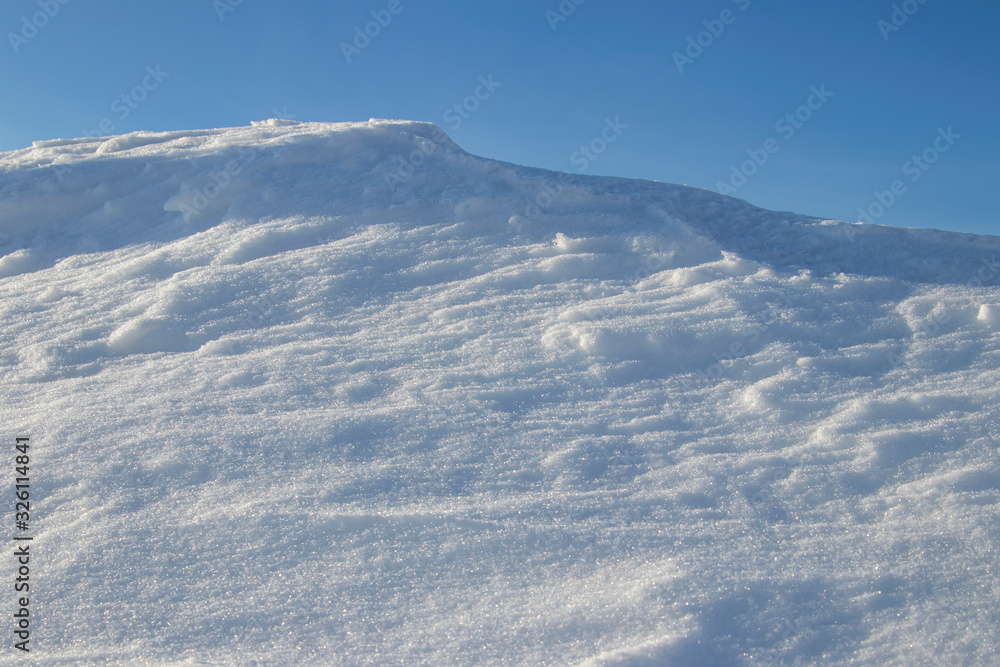 Snowdrift. Snow drift. Applied wind a large pile of snow during blizzards and snow falls. Snowdrift. Snow drift. Applied wind a large pile of snow during blizzards and snow falls.