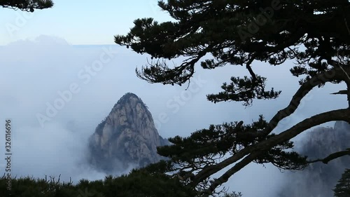 Mist, clouds rising in Huangshan national park, (Yellow Mountain) Anhui Porvince, China. photo